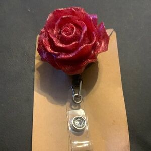 Red rose shaped name badge